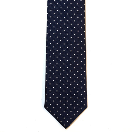 Navy necktie with white polka dots
