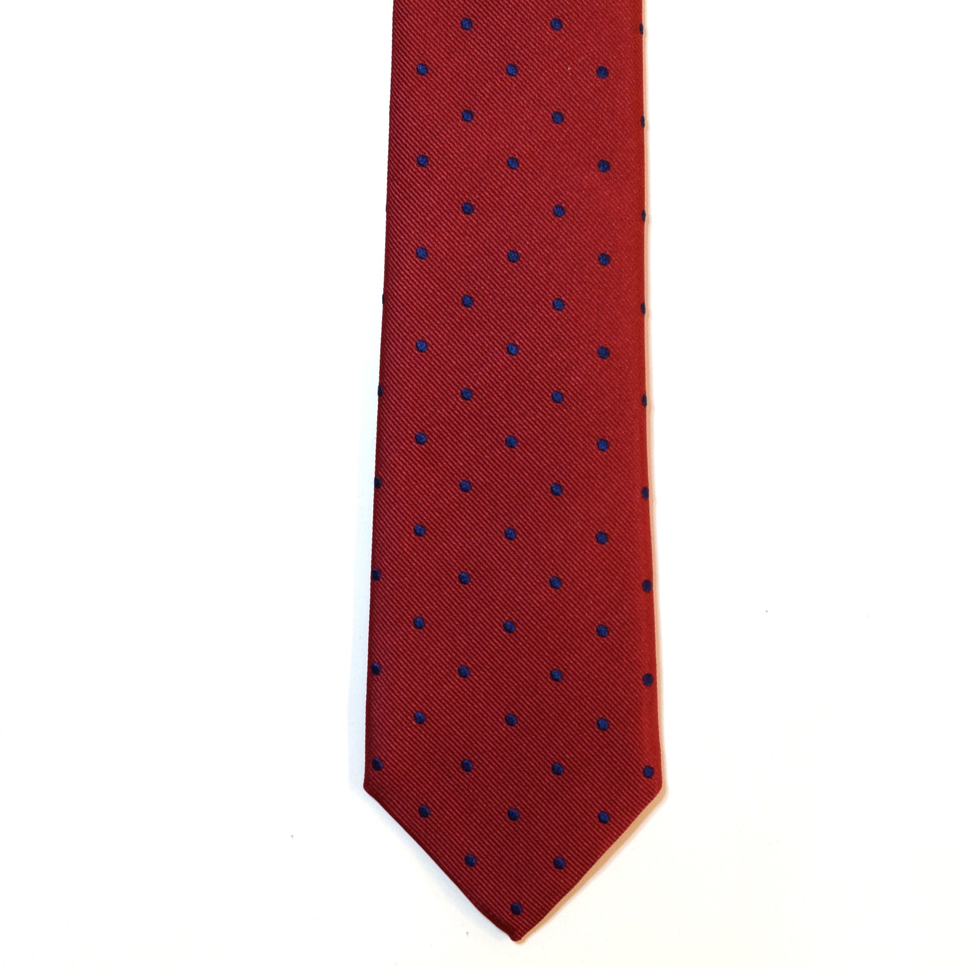 Red necktie with blue polka dots